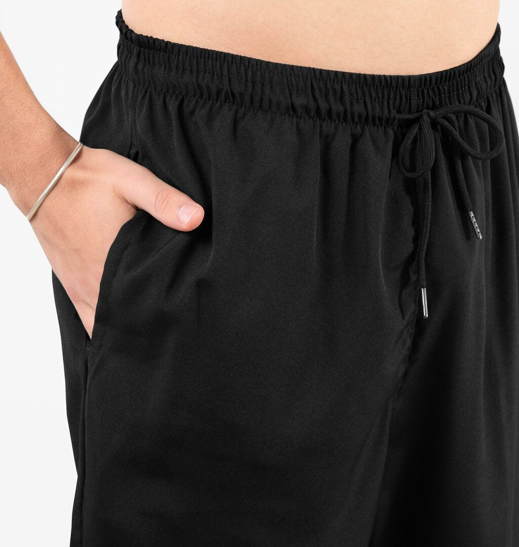 Calça Com Bolsos E Cordão Ajustável