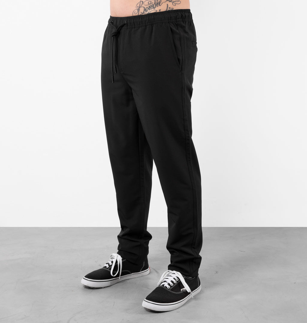 Calça Com Cordão Ajustável E Bolsos